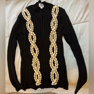 Yal slimming black sweater with unique detail